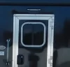 Trailer window with screen